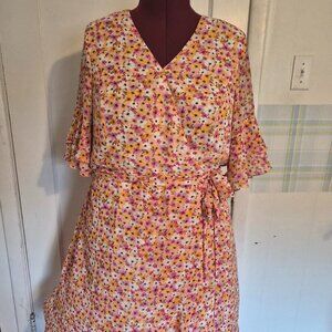 Flirty Floral Dress with Side Tie and Ruffle Details